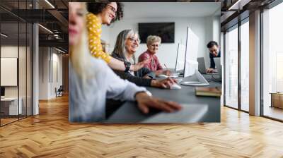 Group of senior people attending computer and technology education class. Wall mural