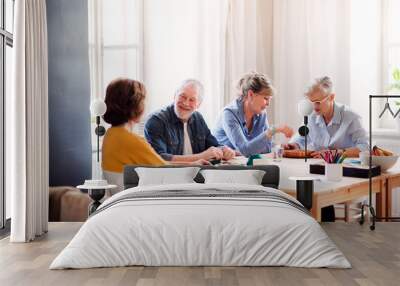 Group of senior people playing board games in community center club. Wall mural