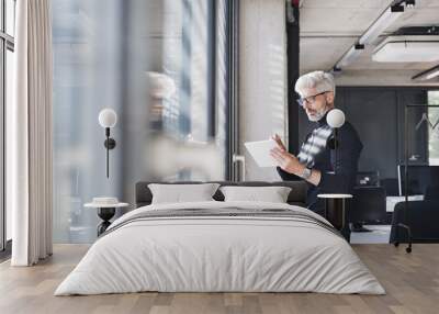 mature businessman with tablet in the office. Wall mural