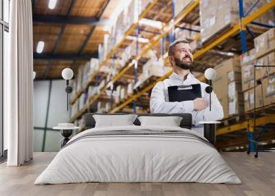 Portrait of a male warehouse worker or supervisor. Wall mural