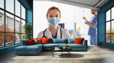 portrait of doctor in quarantine in hospital, coronavirus concept. Wall mural