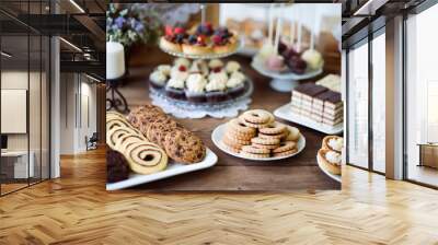 table with various cookies, tarts, cakes, cupcakes and cakepops Wall mural