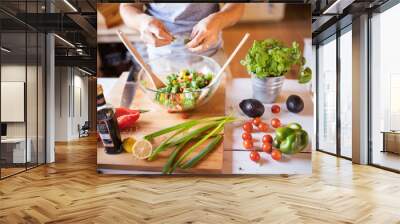 Unrecognizable man cooking. Wall mural