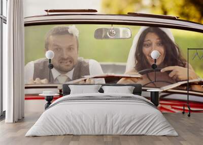 Wedding car with bride and groom Wall mural