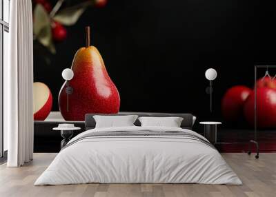 A dark background shows red apples, green pears, and yellow quinces Wall mural