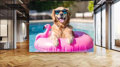 An enjoyable smiley golden retriever wearing sunglasses, swimming in summer pool water in a pink rubber flamingo, enjoying a vacation. Wall mural