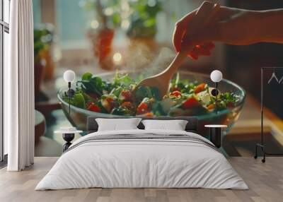 Cooking a healthy meal with a vegetarian concept in the kitchen on a glass table. Closeup of human hands cooking vegetables salad with reflection. Wall mural