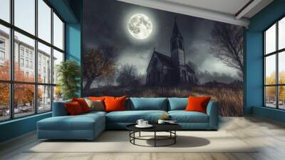 This abandoned church is eerie with the full moon shining through the windows on a spooky Halloween night Wall mural