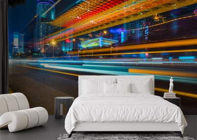 the light trails on the modern building background. Wall mural