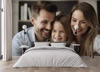 A family of three smiling at each other. Wall mural