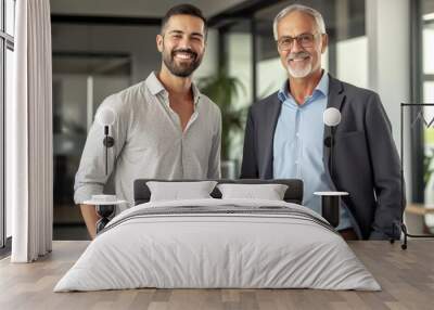 A portrait of two smiling businessmen standing in an office.  Wall mural