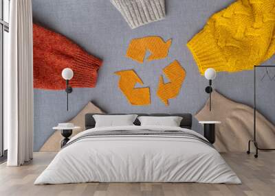 Clothing recycling. Used clothes. Ecological and sustainable fashion. sleeves of autumn woolen sweaters. reduce waste concept. High quality photo Wall mural