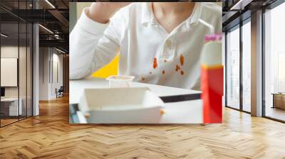 Dirty ketchup stains on white clothes. Kids eat unhealthy fat food. daily life stain concept. High quality photo Wall mural