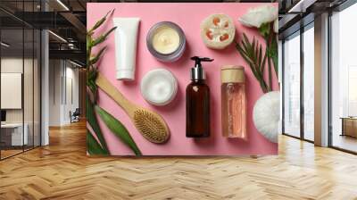 Embark on a visual journey as we explore an artfully arranged flat lay composition featuring an array of personal care products. Set against a soft and soothing pink background Wall mural