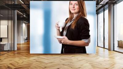 Businesswoman drinking coffee Wall mural