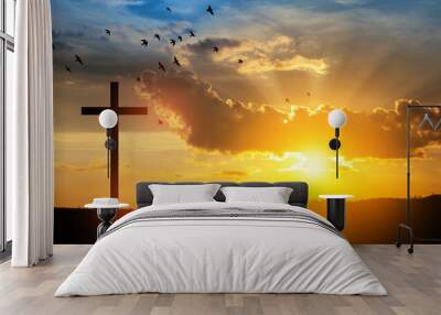 Christian cross on hill outdoors at sunrise. Resurrection of Jesus. Wall mural