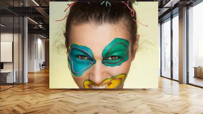 Portrait of young woman with art fashion makeup Wall mural