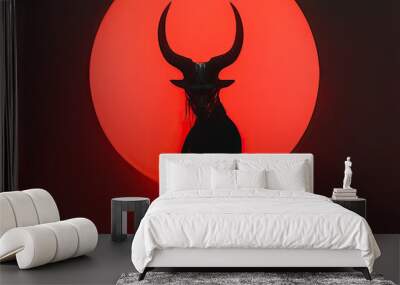 silhouette of a devil with horns on red circle background
 Wall mural