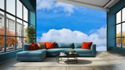 Clouds on a blue sky sunny day Wall mural