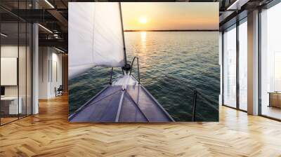 Sailing to the sunset with a luxury yacht. Wall mural