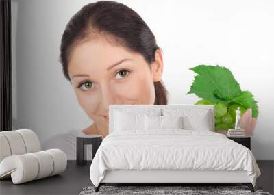 Young attractive lady with green grape cluster Wall mural