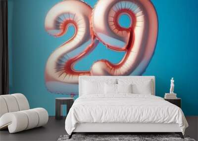 balloon in a shape of number 29 on blue background for birthday celebration Wall mural