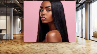 Beauty portrait black woman with sleek long hair against a pink background Wall mural