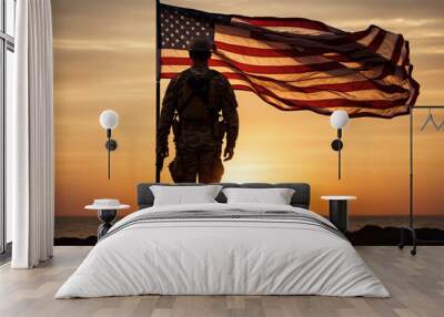 american soldier holding a flag on the peak of a mountain at sunset. copy space for text Wall mural