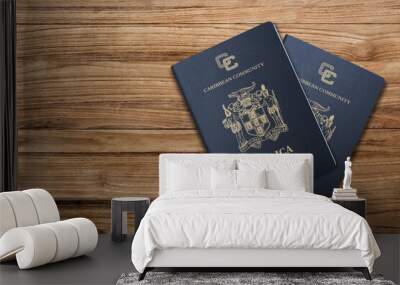 Jamaican passport on dark brown wooden board ,The Jamaican passport is issued to citizens of Jamaica for international travel.  Wall mural