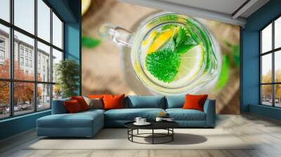 Wooden table with Lemonade (selective focus) Wall mural