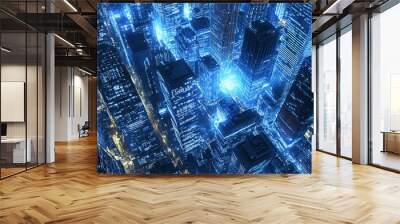 An aerial view of a city at night with glowing blue lights Wall mural