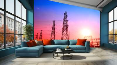 High piezoelectric towers, in the setting sun Wall mural