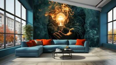 A person is holding a light bulb in their hand, surrounded by smoke Wall mural