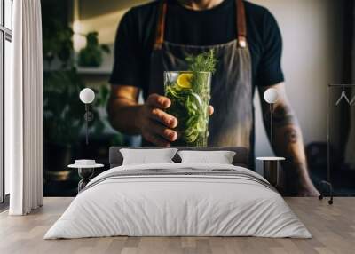 A man holding a smoothie with kelp and other superfoods in a modern kitchen Wall mural