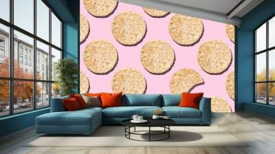 Seamless pattern Whole and bitten round gluten-free rice loaf on pink background Wall mural