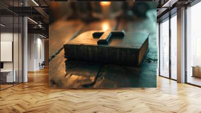 Little wooden Christian cross and bible on the table background with candle light and old wooden rough table , faith and hope background, God holy copy space church pray Jesus gospel Wall mural