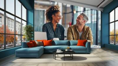 people working together in office, two colleagues working and smiling  Wall mural