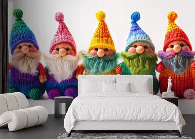 Seven cute knitted gnomes on a white background Wall mural