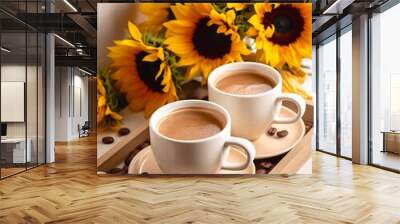 Two cups of black coffee and bouquet of sunflowers on a wooden tray. Wall mural