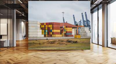  stacked container and cranes at harbor - freight concept Wall mural