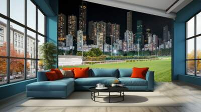 Empty race track and skyline background, Horse racing course in Hong Kong  Wall mural