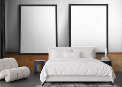 two empty picture frames on wooden parquet floor white wall background  , blank frame  Wall mural