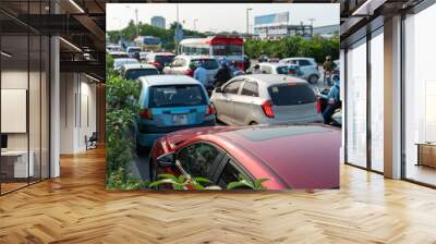 Cars on urban street in traffic jam at rush hour in big city Wall mural