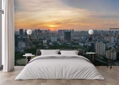 Cityscape of Hanoi skyline at Cau Giay park during sunset time in Hanoi city, Vietnam Wall mural