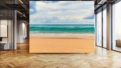 View of the paradise beach with golden sand, waves on the sea and the sky with clouds Wall mural