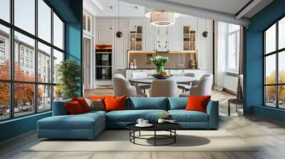 A modern dining room with white cabinets, a round table, and white chairs Wall mural