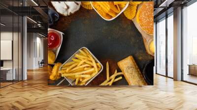 Junk food on table. Fast carbs not good for health, heart and skin. Space for text Wall mural