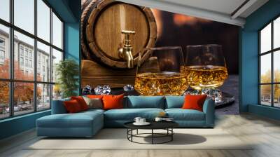 Two glasses of Cognac with ice cubes Wall mural