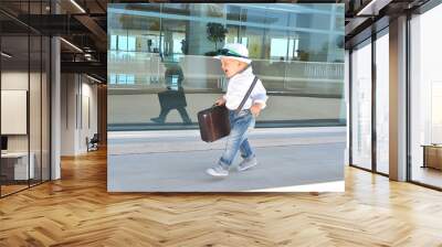 Young traveler with a suitcase Wall mural