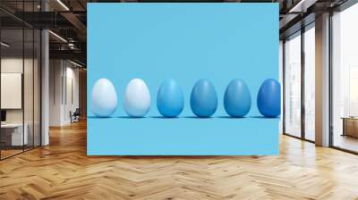 Blue Monotone Eggs on blue background. minimal Easter Idea Concept. Wall mural